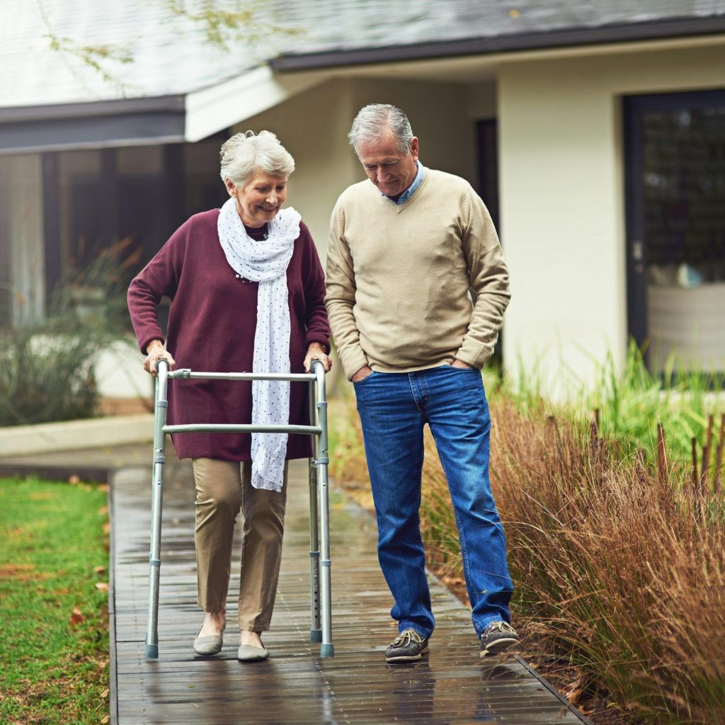 Youre only as old as you feel. Shot of a loving senior couple taking a walk outside.
